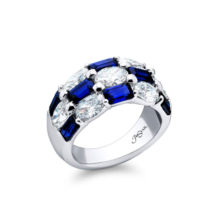 Elegance Elevated: Our signature Three-Row Sapphire Band. These gorgeous emerald-cut sapphires cradled in oval diamonds are handcrafted in pure platinum.