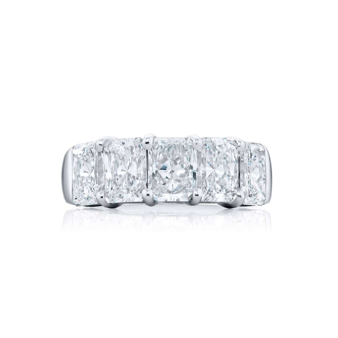 Elegance Elevated: Our classic single row GIA certified 5.03 ctw. Diamond Band. These five beautiful radiant-cut diamonds are handcrafted in pure platinum.