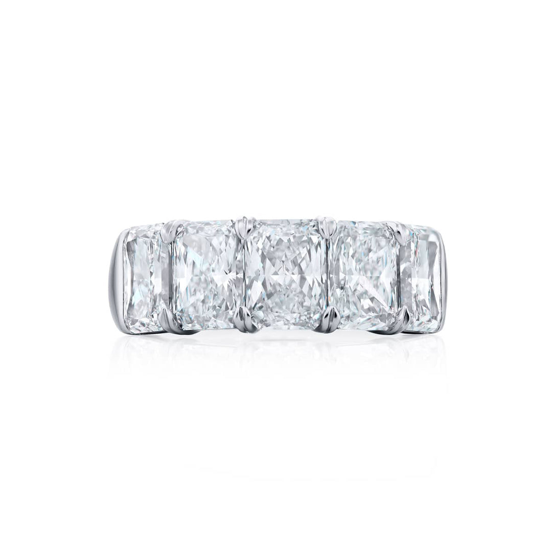 Elegance Elevated: Our stunning single row 5.13 ctw. GIA certified Diamond Band. These five beautiful radiant-cut diamonds are handcrafted in pure platinum.