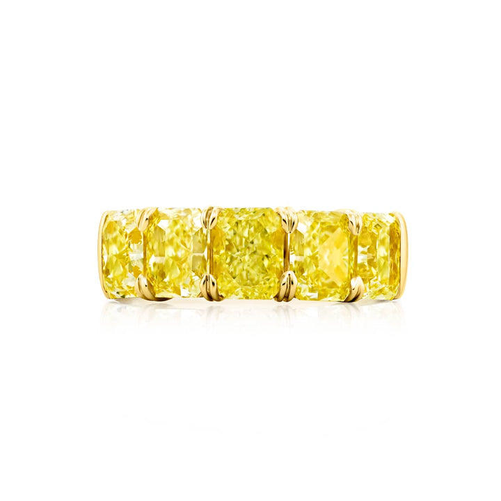Elegance Elevated: Our stunning 5.05 ctw. GIA certified Fancy Yellow Diamond Band. These five beautiful radiant-cut fancy yellow diamonds are handcrafted in 18KY gold.