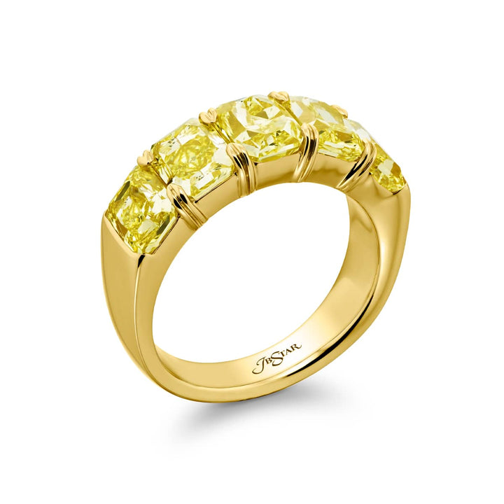 Elegance Elevated: Our stunning 5.05 ctw. GIA certified Fancy Yellow Diamond Band. These five beautiful radiant-cut fancy yellow diamonds are handcrafted in 18KY gold.
