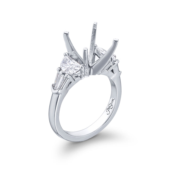 Dazzling Brilliance: Our timeless Diamond Semi-mount. These two half-moon diamonds accompanied by four beautiful tapered baguette diamonds are handcrafted in pure platinum.