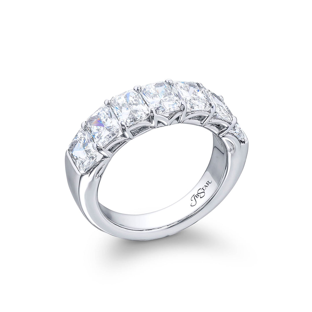 Elegance Elevated: Our signature GIA certified Diamond Band. These seven beautiful radiant-cut diamonds are handcrafted in pure platinum.