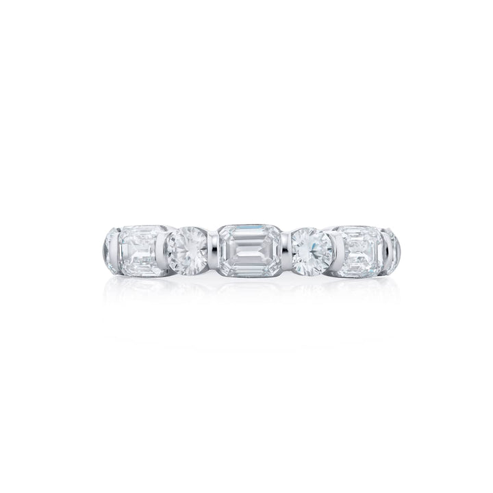 Elegance Elevated: Our signature 2.25 ctw. East-West Bar Set Diamond Band. These beautiful emerald-cut diamonds blending with round diamonds are handcrafted in pure platinum.