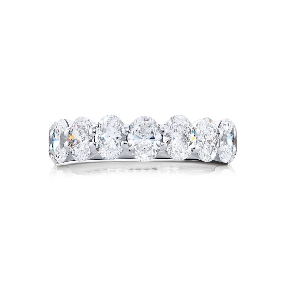 Elegance Elevated: Our classic single row 2.72 ctw. Diamond Band. These nine stunning oval diamonds are handcrafted in pure platinum.