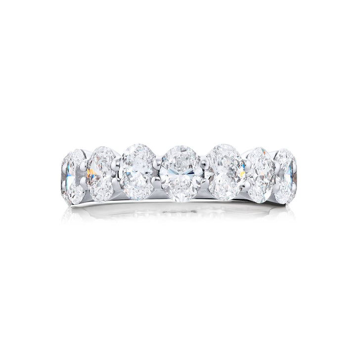 Elegance Elevated: Our classic single row 2.72 ctw. Diamond Band. These nine stunning oval diamonds are handcrafted in pure platinum.