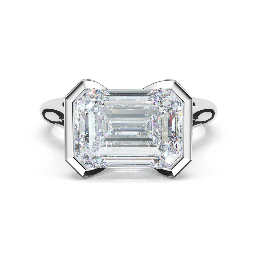 Emerald East-West Semi Bezel Solitaire Engagement Ring in Platinum