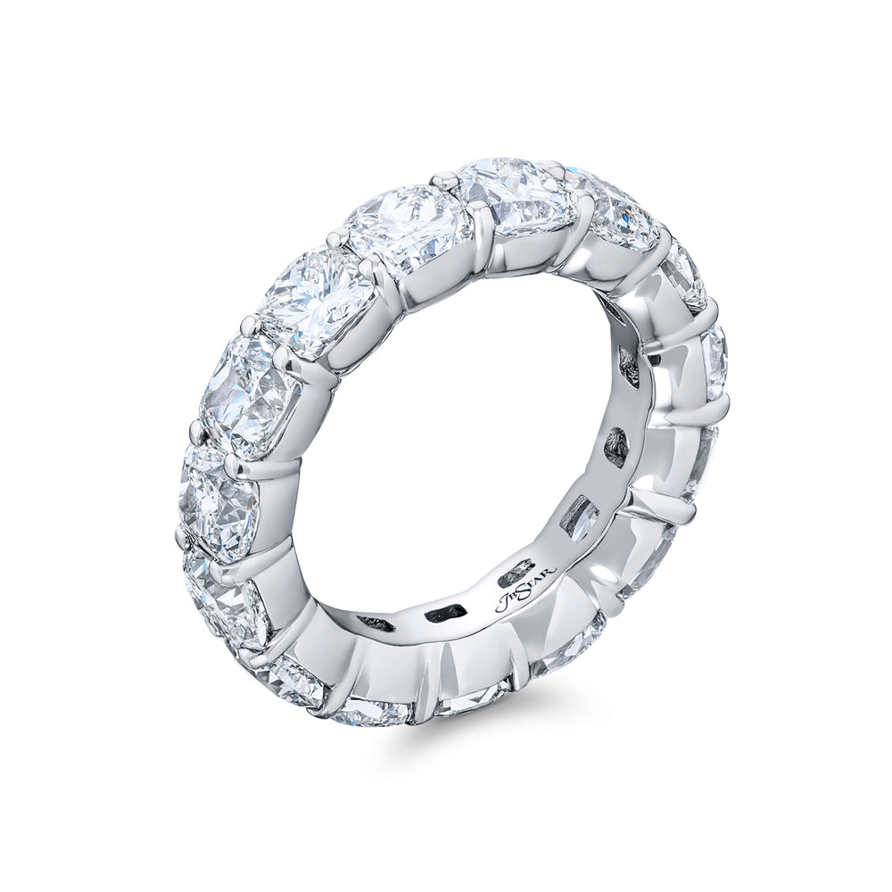 Alluring Eternity: Our magnificent 6.90 ctw. Diamond Eternity Band. These fifteen stunning cushion-cut diamonds are handcrafted in pure platinum.
