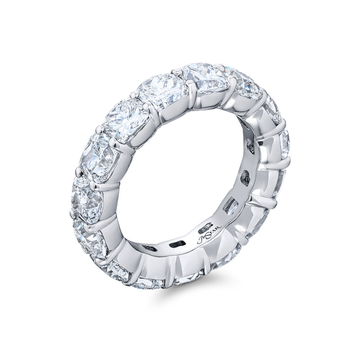 Alluring Eternity: Our magnificent 6.90 ctw. Diamond Eternity Band. These fifteen stunning cushion-cut diamonds are handcrafted in pure platinum.