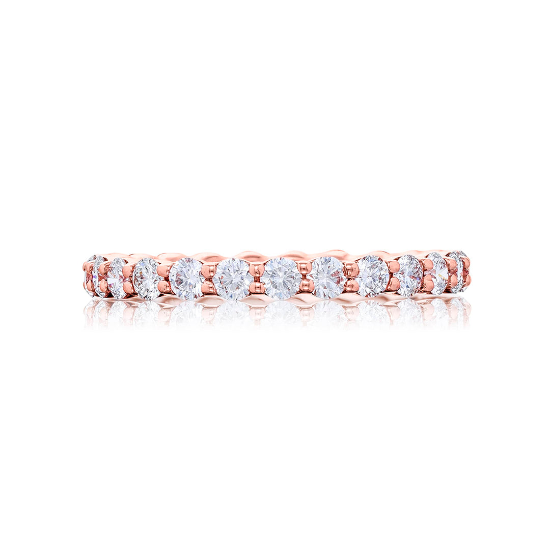 Alluring Eternity: Our stunning Diamond Eternity Band. These dazzling twenty-five round diamonds are handcrafted in 18KY pink gold.