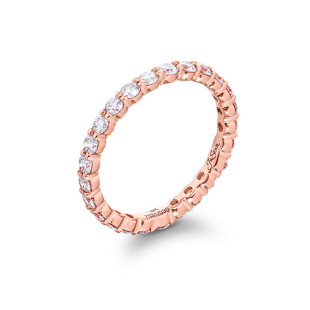 Alluring Eternity: Our stunning Diamond Eternity Band. These dazzling twenty-five round diamonds are handcrafted in 18KY pink gold.