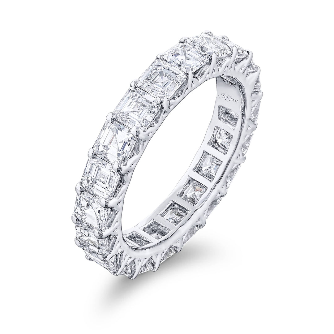 Stunning diamond eternity band featuring 20 perfectly matched square emerald-cut diamonds. Handcrafted in pure platinum.