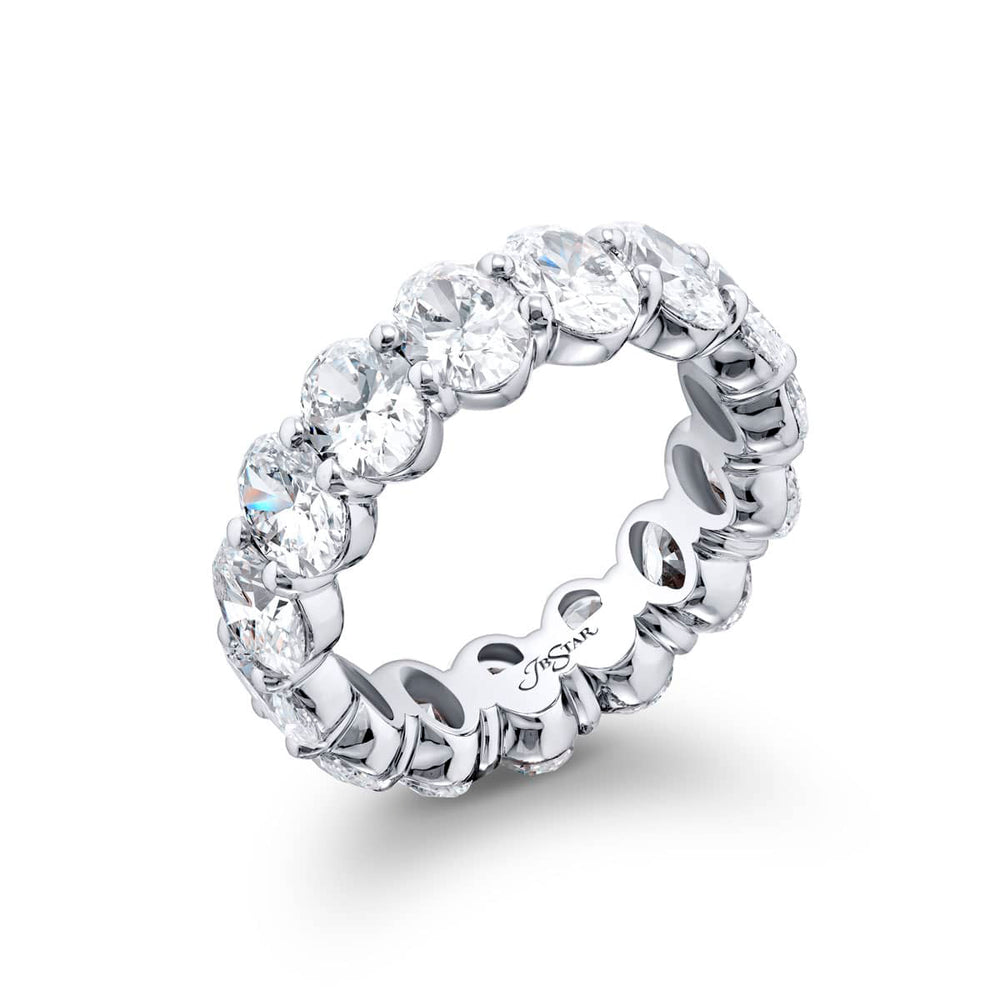 Alluring Eternity: Our beautiful single-row GIA certified Diamond Eternity Band. These fifteen oval diamonds are handcrafted in pure platinum.