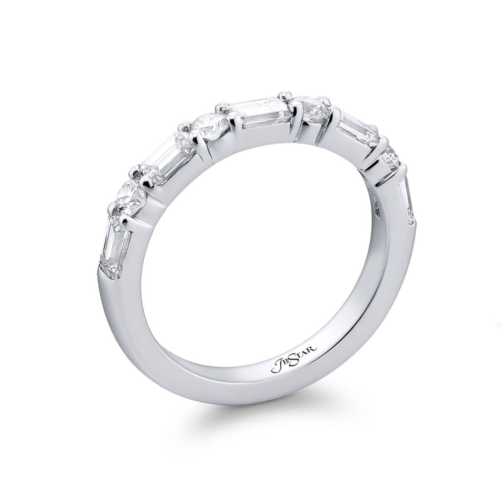 Elegance Elevated: Our classic East-West single row Diamond Band. These stunning straight baguette and round diamonds are handcrafted in pure platinum.