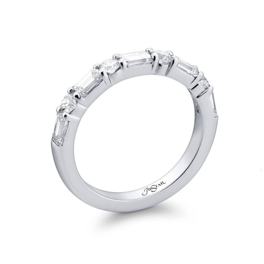 Elegance Elevated: Our classic East-West single row Diamond Band. These stunning straight baguette and round diamonds are handcrafted in pure platinum.