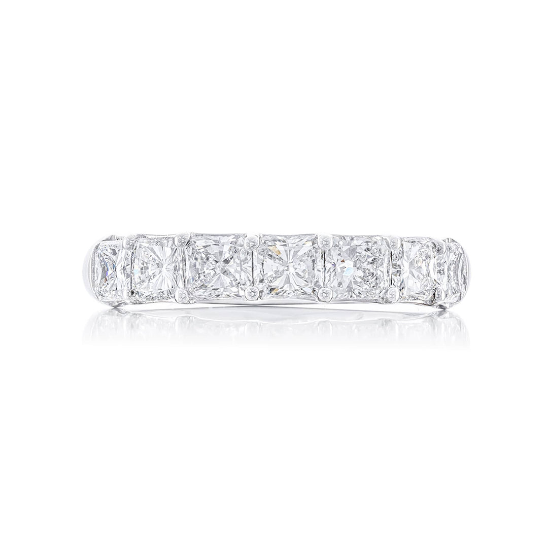 Beautiful diamond wedding band featuring 7 perfectly matched radiant-cut diamonds in a shared prong setting. Handcrafted in pure platinum.
