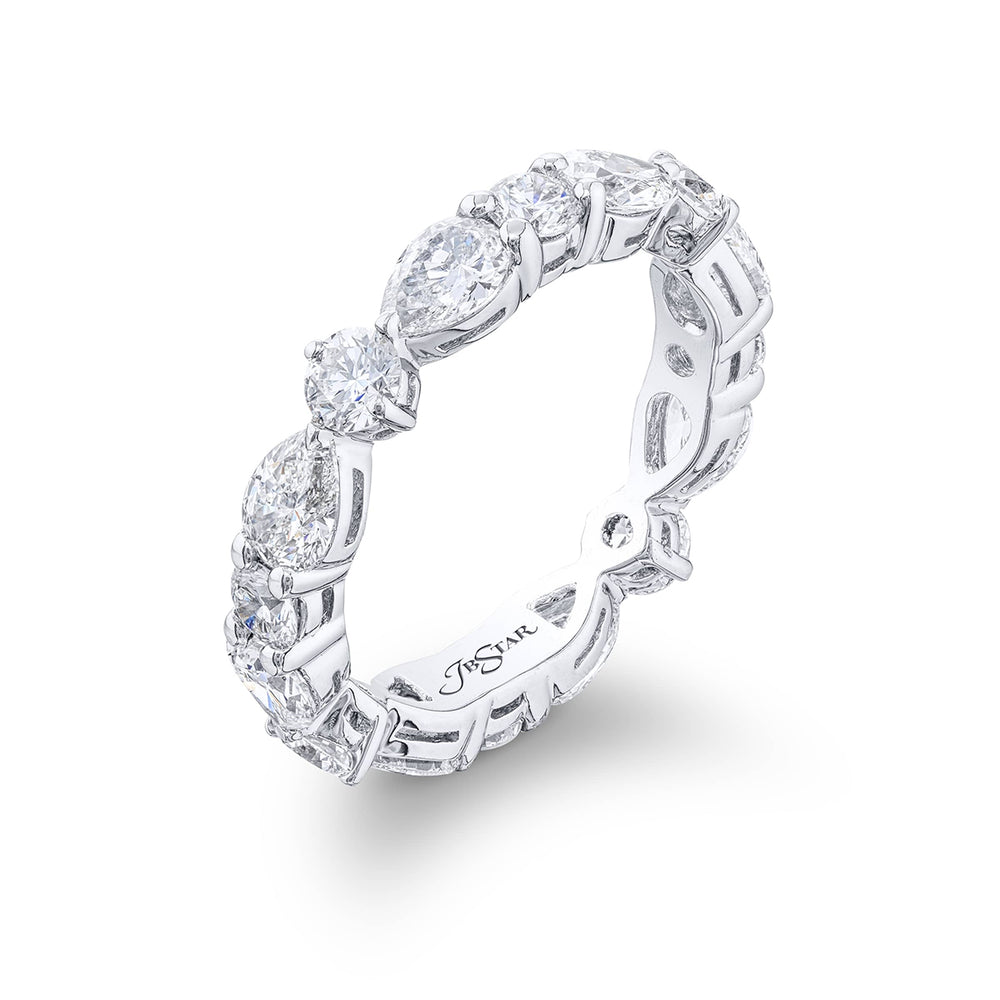 Stunning diamond eternity band featuring 8 round and 8 pear shaped-cut diamonds in a shared prong setting. Handcrafted in pure platinum.
