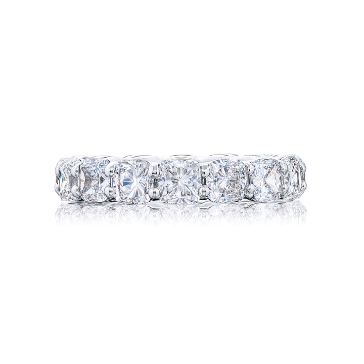 Alluring Eternity: Our stunning Diamond Eternity Band. These dazzling seventeen cushion-cut diamonds are handcrafted in pure platinum.