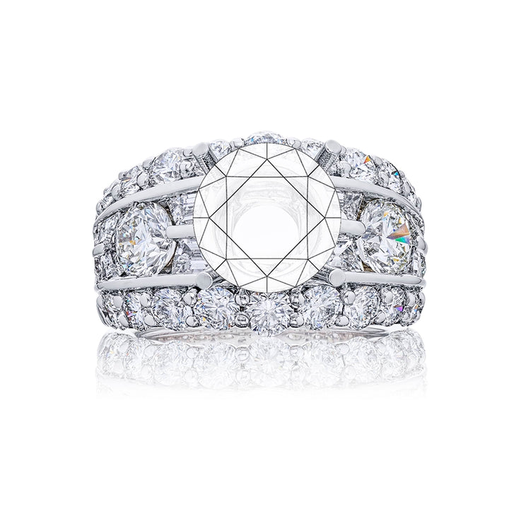Gorgeous wided iamond semi mount featuring round diamonds and tapered baguette diamonds in a center channel and edged in round diamond pave. Handcrafted in pure platinum.