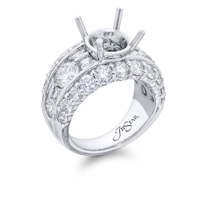 Gorgeous wided iamond semi mount featuring round diamonds and tapered baguette diamonds in a center channel and edged in round diamond pave. Handcrafted in pure platinum.