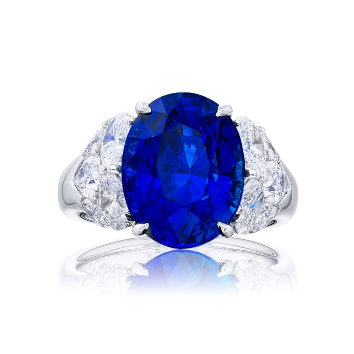 Stunning sapphire and diamond ring featuring a magnificent 8.51ct. certified oval  sapphire embraced by marquise pear-shape and oval diamonds. Handcrafted in pure platinum.