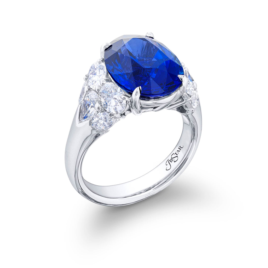 Stunning sapphire and diamond ring featuring a magnificent 8.51ct. certified oval  sapphire embraced by marquise pear-shape and oval diamonds. Handcrafted in pure platinum.
