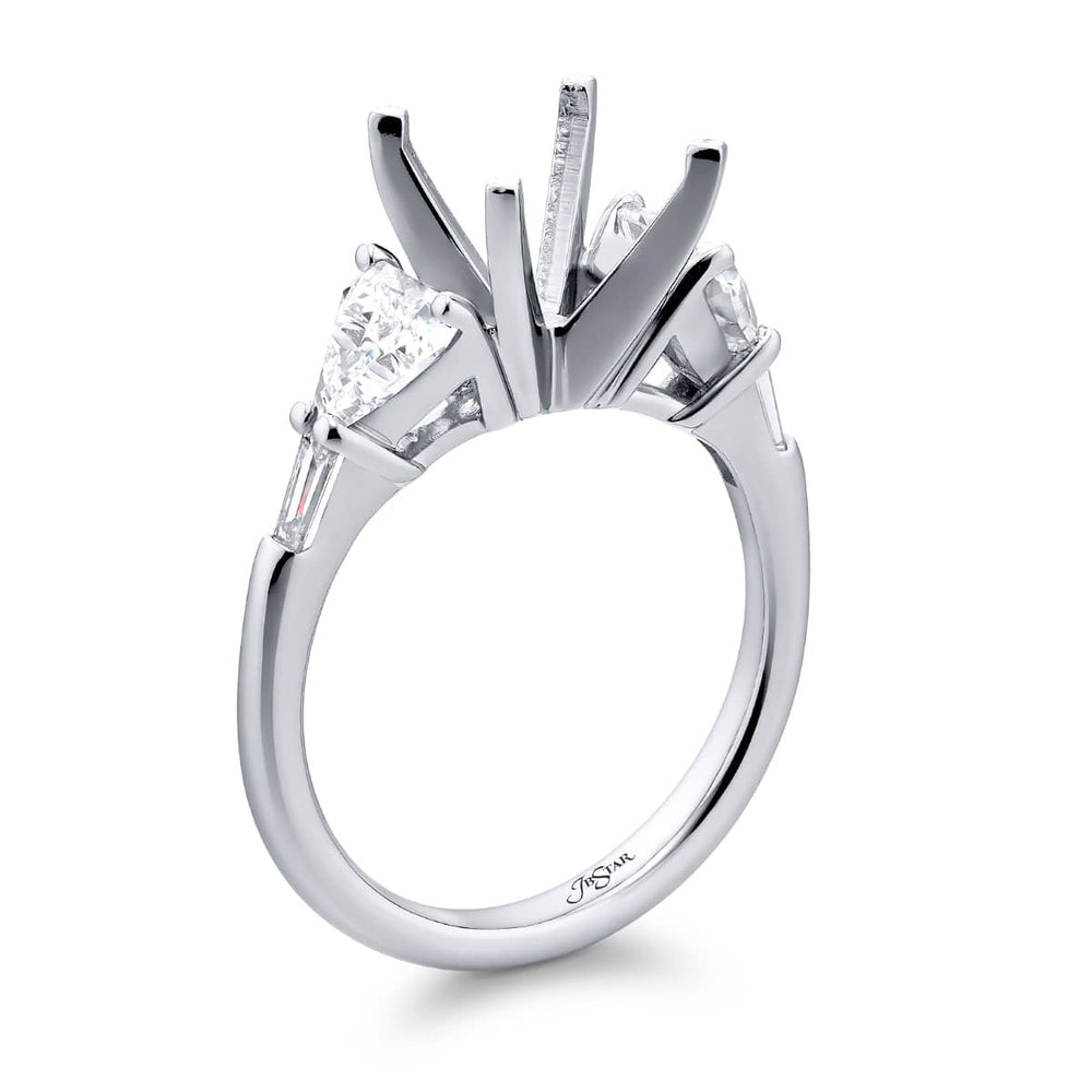 Dazzling Brilliance: Our beautiful Diamond Semi-mount. These two stunning trillion diamonds accompanied by two tapered baguette diamonds handcrafted in pure platinum.