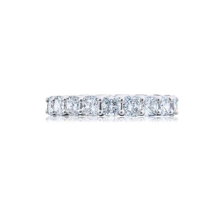Alluring Eternity: Our beautiful 4.12 ctw. single-row Diamond Eternity Band. These nineteen cushion-cut diamonds are handcrafted in pure platinum.m.
