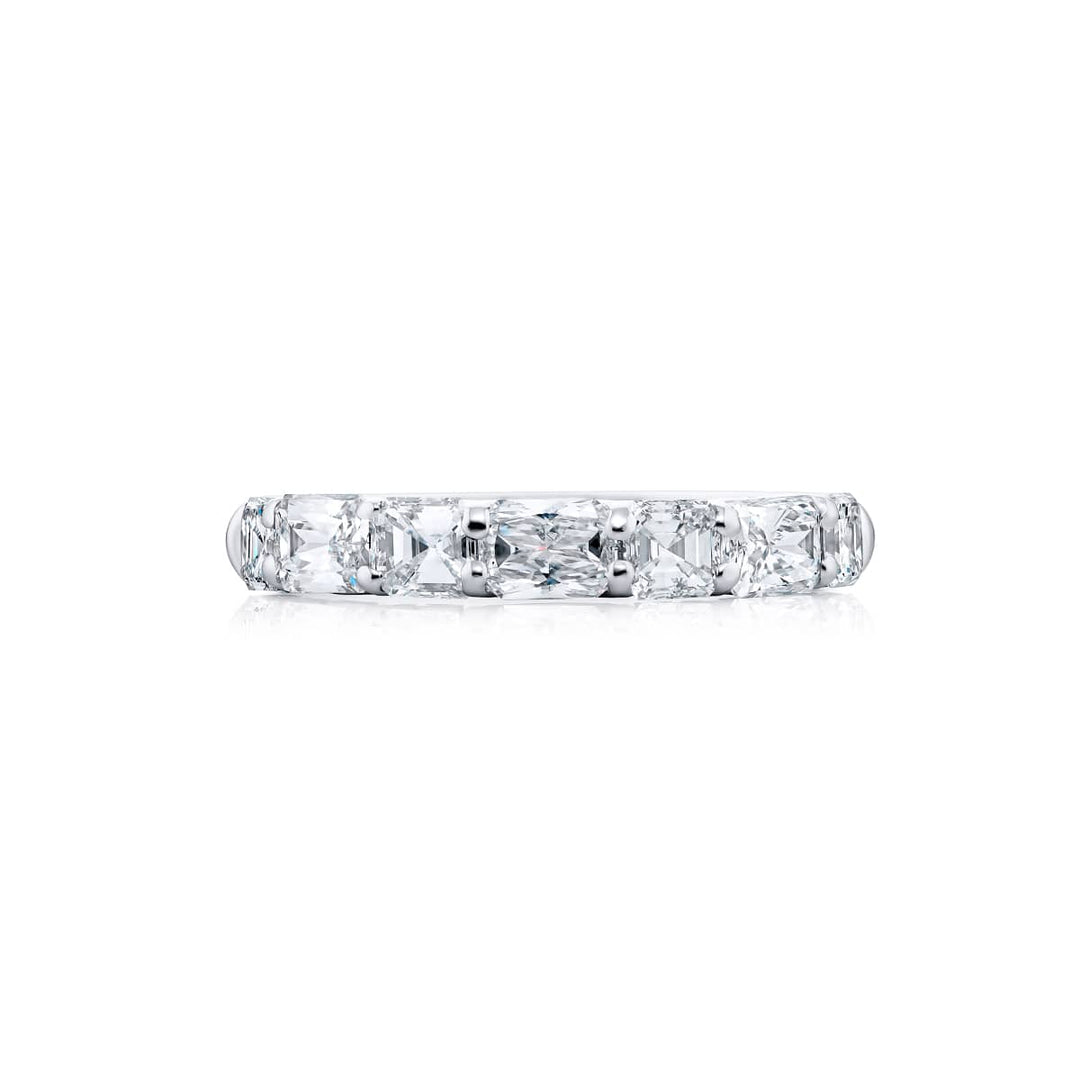 Elegance Elevated: Our classic 1.70 ctw. East-West single row Diamond Band. These beautiful square emerald-cut diamonds accompany radiant-cut diamonds and are handcrafted in pure platinum.