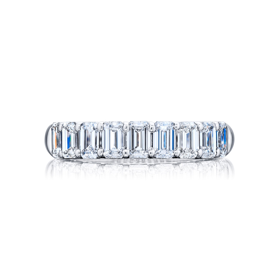 Elegance Elevated: Our stunning 1.64 ctw. Diamond Band. These nine beautiful emerald-cut diamonds are handcrafted in pure platinum.