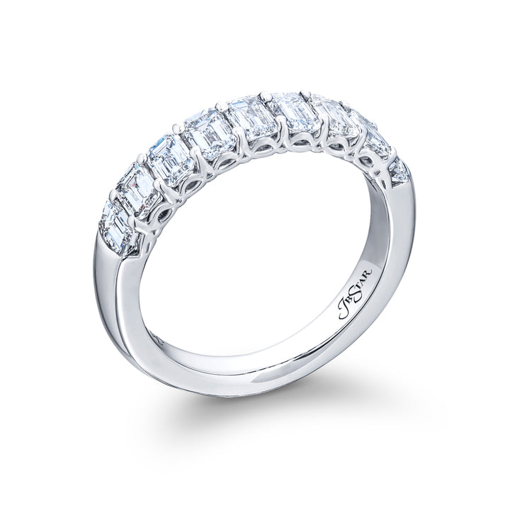 Elegance Elevated: Our stunning 1.64 ctw. Diamond Band. These nine beautiful emerald-cut diamonds are handcrafted in pure platinum.