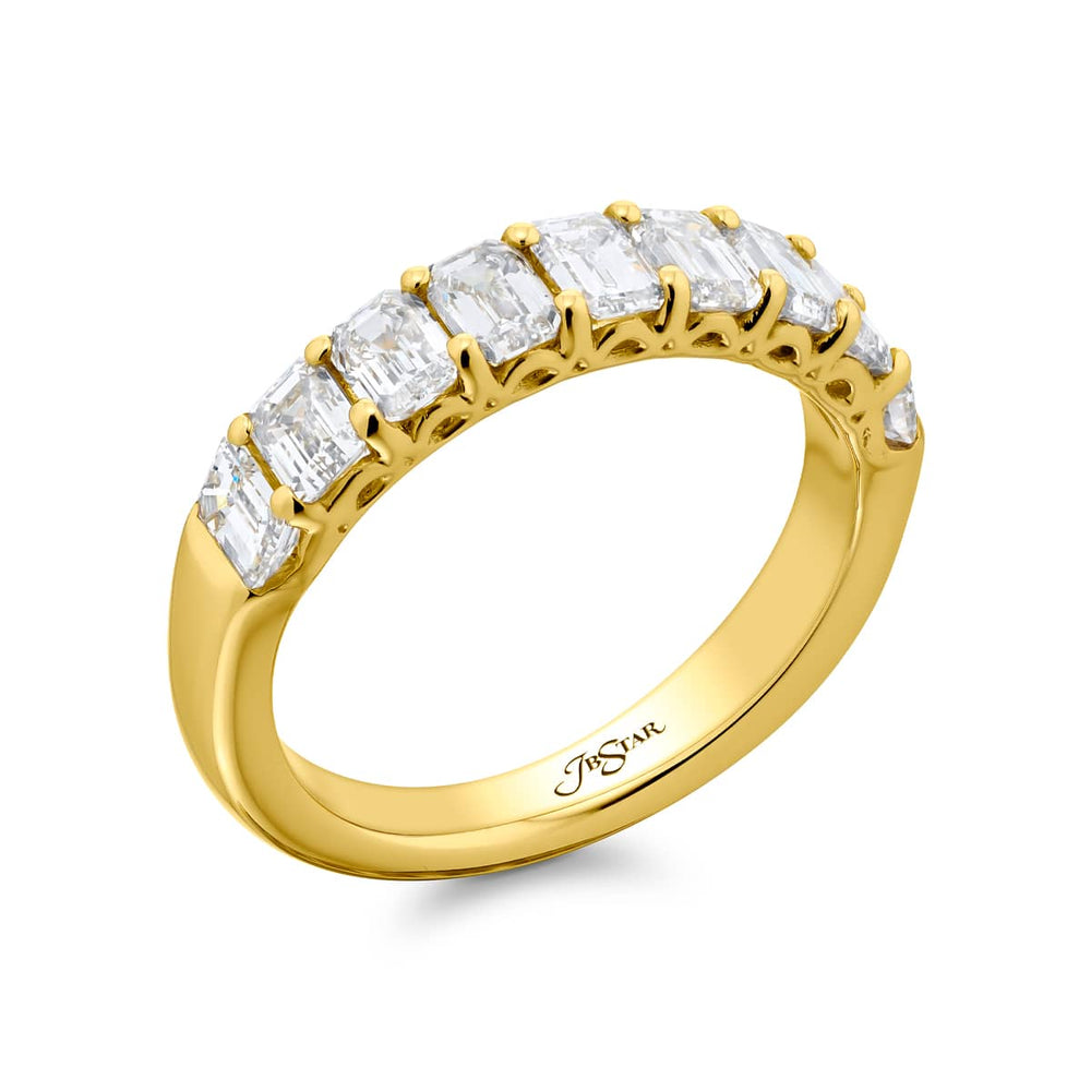 Elegance Elevated: Our classic 1.73 ctw. Diamond Band. These nine beautiful emerald-cut diamonds are handcrafted in 18KY gold.