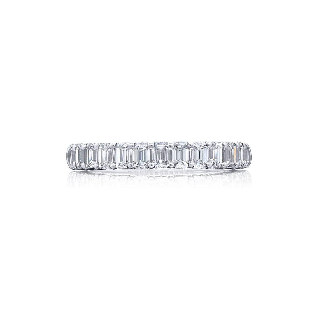 Elegance Elevated: Our classic single row Diamond Band. These thirteen beautiful emerald-cut diamonds are handcrafted in pure platinum.