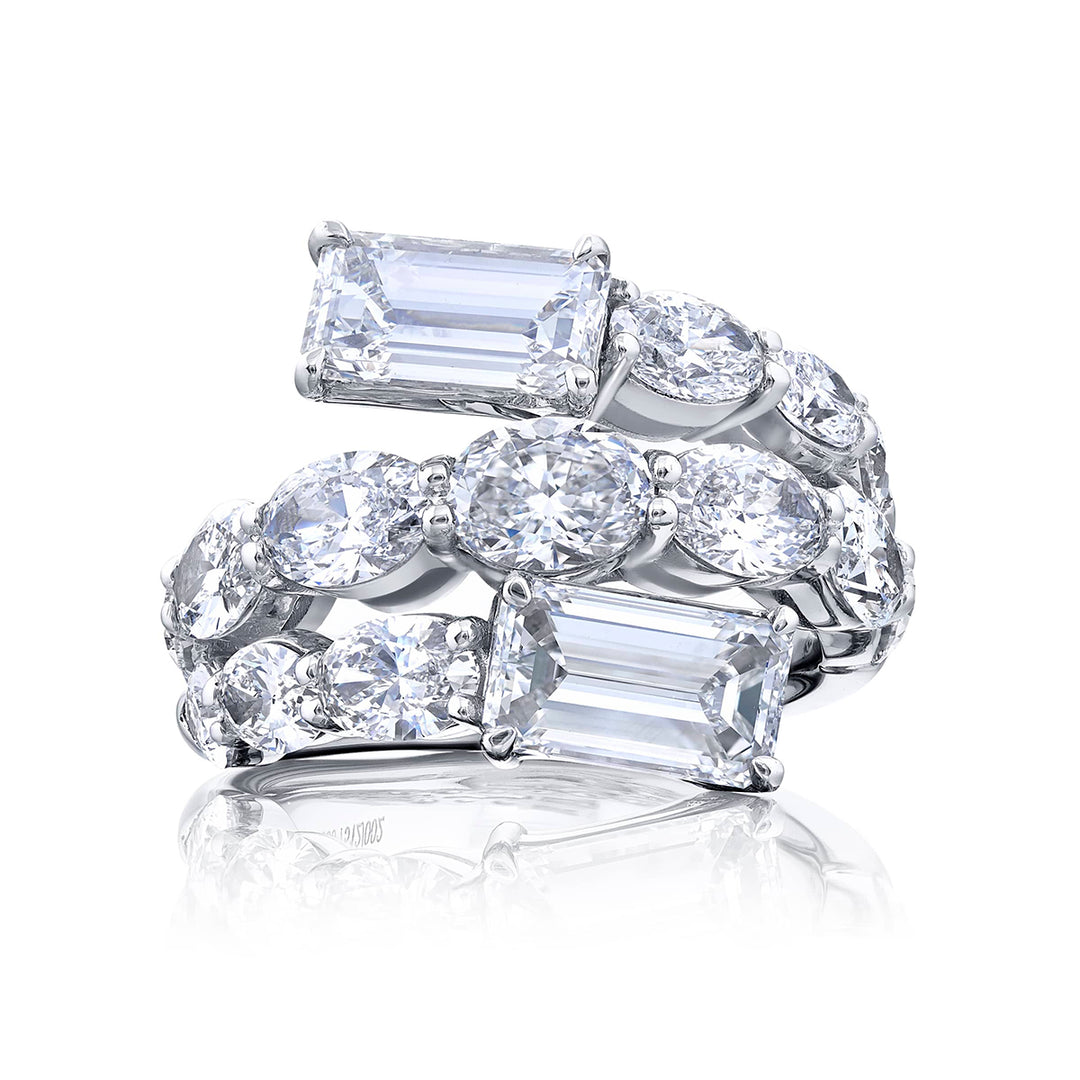 Dazzling Brilliance: Our signature 2.03 ctw. GIA certified Three-Row Twogether Diamond Ring. These stunning emerald-cut diamonds accompanied by shimmering oval and pear-shaped diamonds are handcrafted in pure platinum.