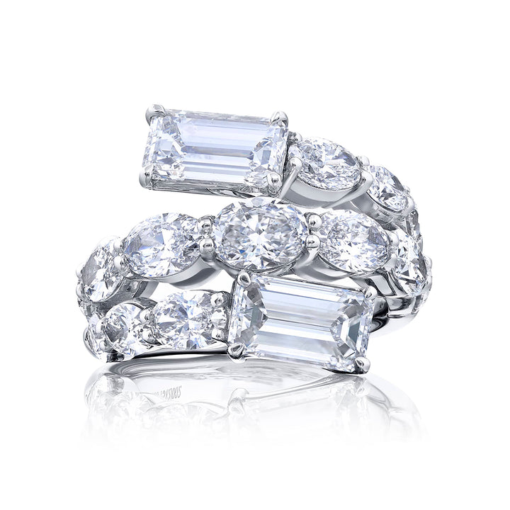 Dazzling Brilliance: Our signature 2.03 ctw. GIA certified Three-Row Twogether Diamond Ring. These stunning emerald-cut diamonds accompanied by shimmering oval and pear-shaped diamonds are handcrafted in pure platinum.