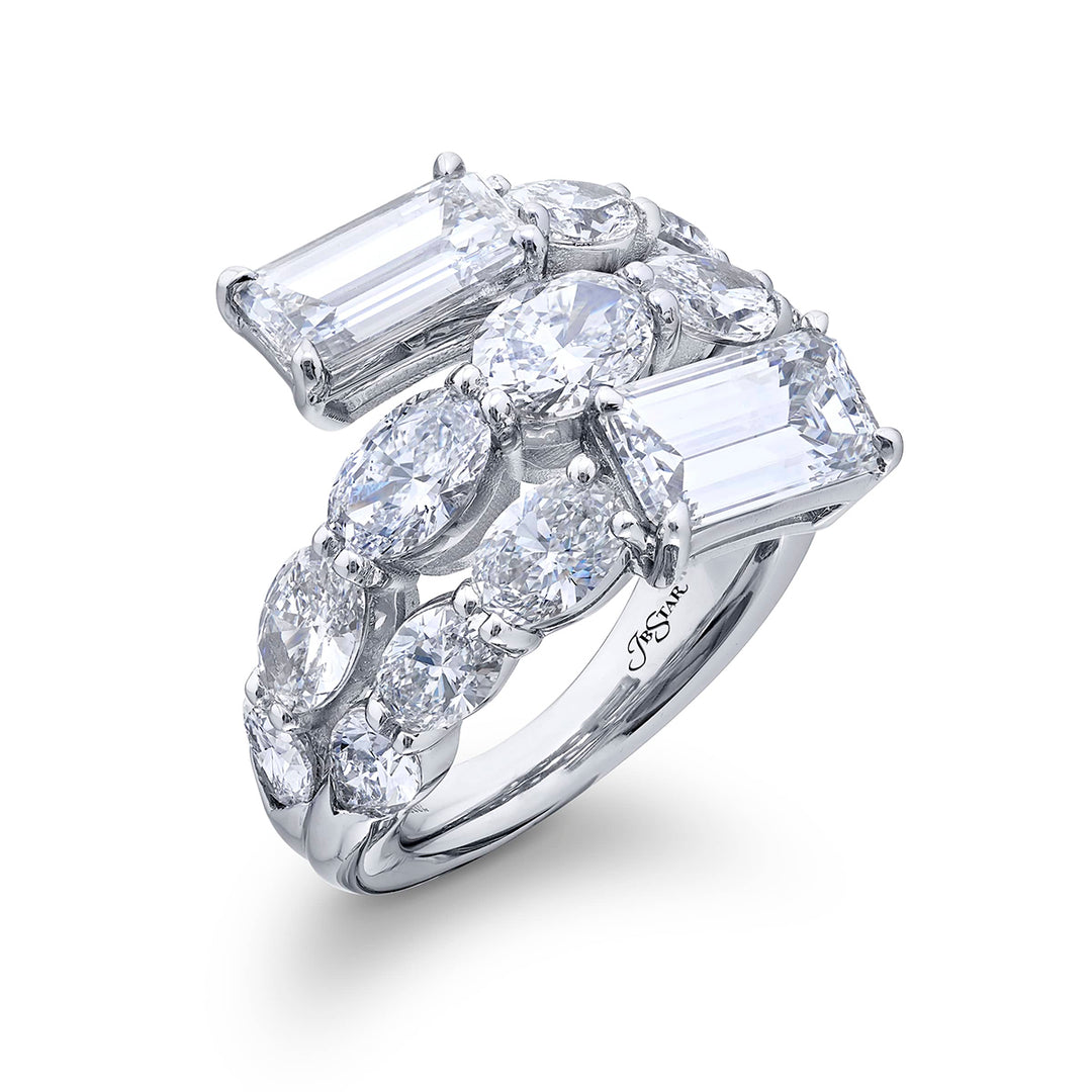 Dazzling Brilliance: Our signature 2.03 ctw. GIA certified Three-Row Twogether Diamond Ring. These stunning emerald-cut diamonds accompanied by shimmering oval and pear-shaped diamonds are handcrafted in pure platinum.