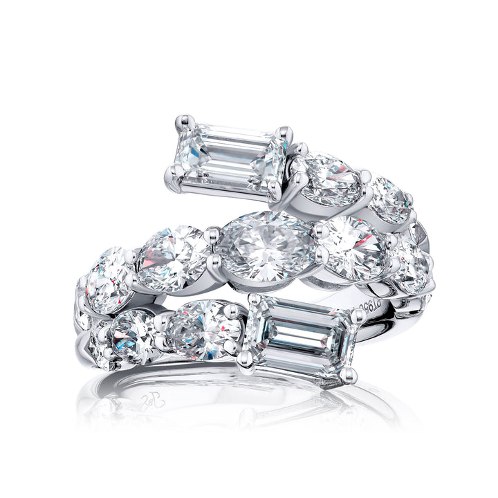 Dazzling Brilliance: Our signature 1.50 ctw. GIA certified Three-Row Twogether Diamond Ring. These stunning emerald-cut diamonds accompanied by shimmering oval and pear-shaped diamonds are handcrafted in pure platinum.