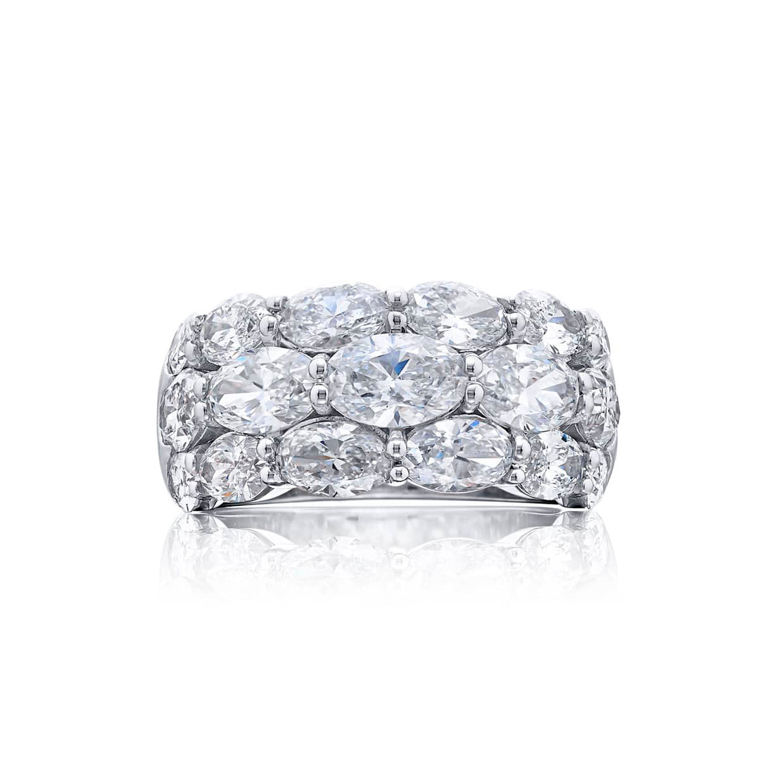 Elegance Elevated: Our signature 5.07 ctw. Three-row East-West Diamond Band. These seventeen dazzling oval diamonds are handcrafted in pure platinum.