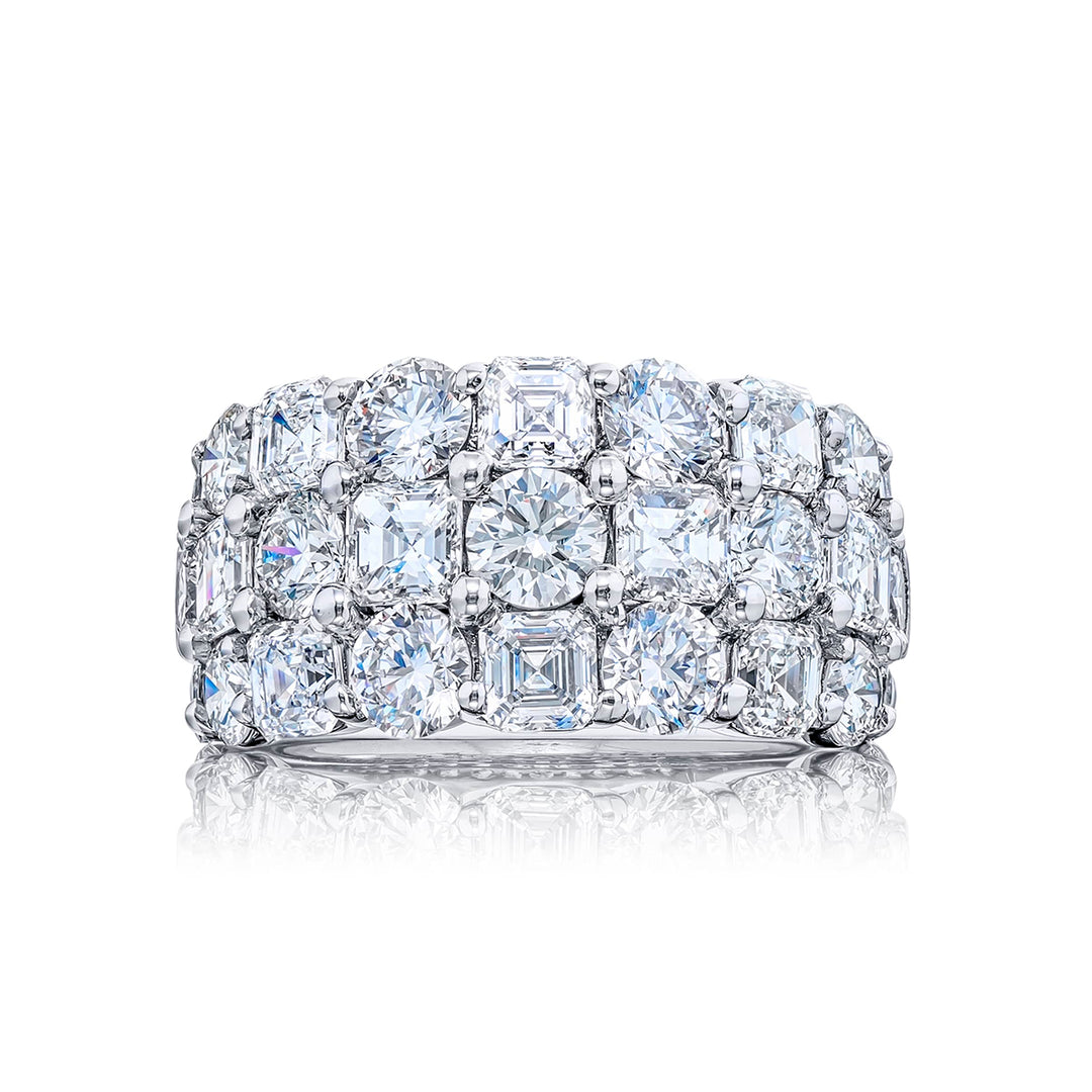 Elegance Elevated: Our iconic three-row Diamond Band. These square emerald-cut diamonds blend with round diamonds and are handcrafted in pure platinum.