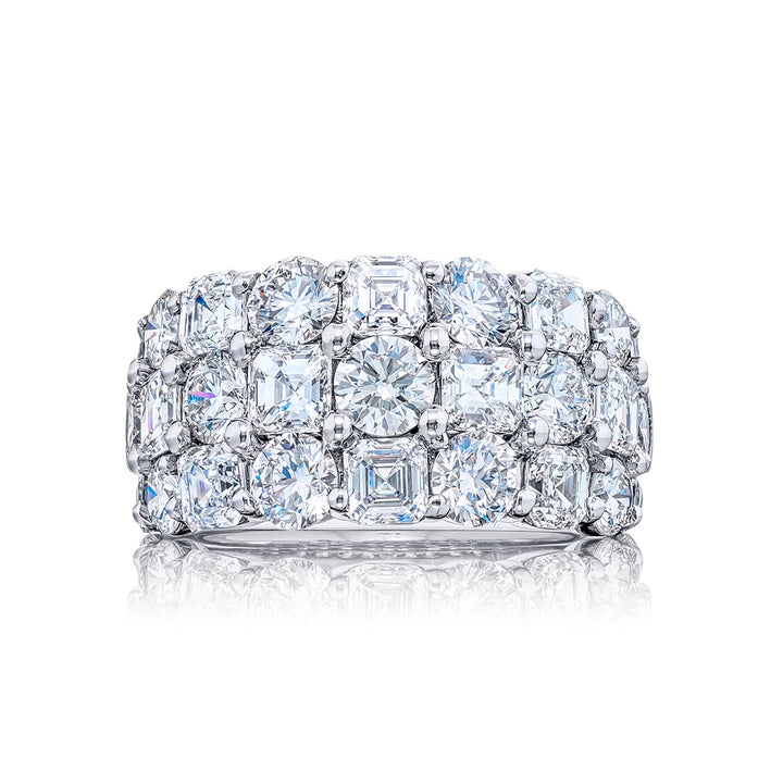 Elegance Elevated: Our iconic three-row Diamond Band. These square emerald-cut diamonds blend with round diamonds and are handcrafted in pure platinum.