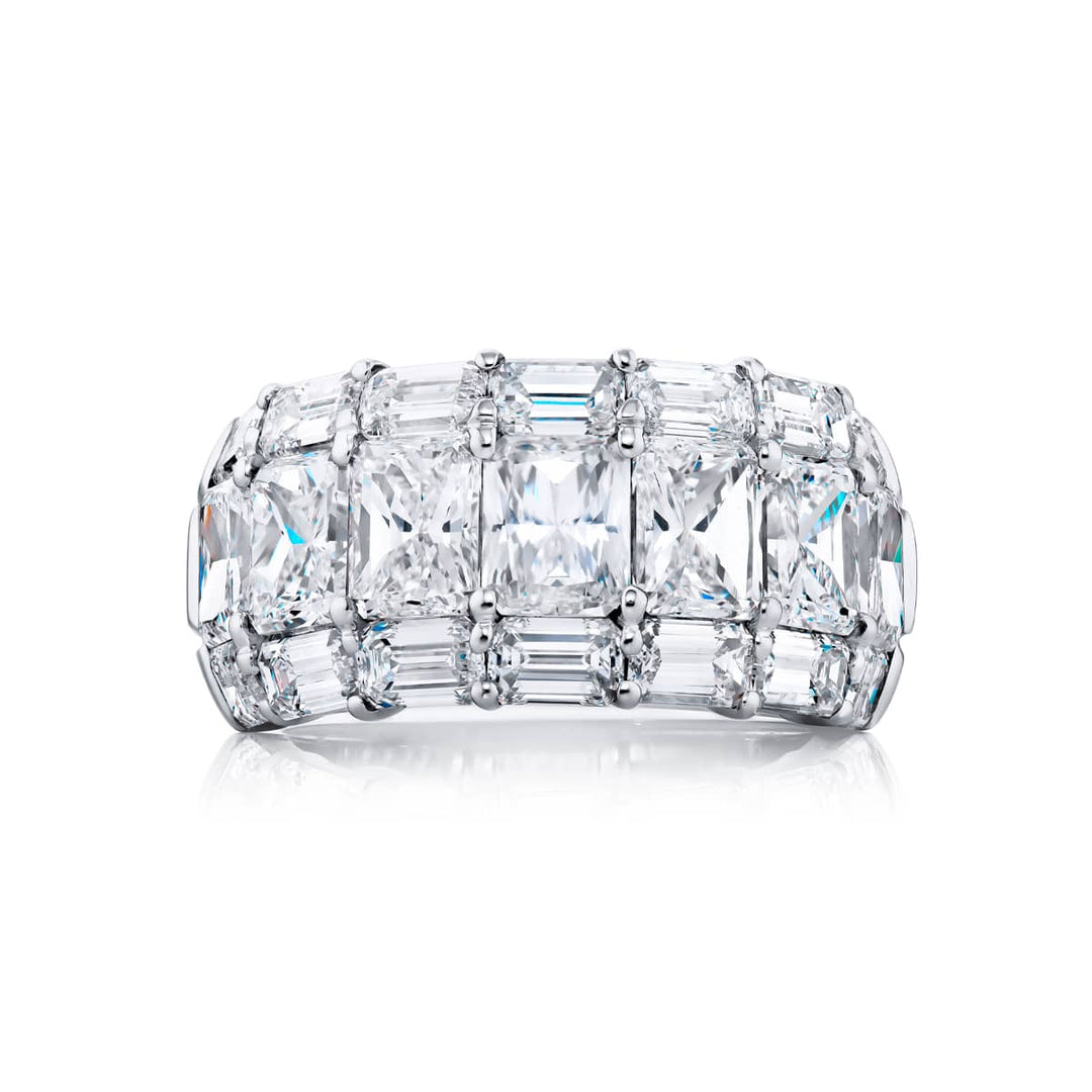 Elegance Elevated: Our iconic 7.50 ctw. East-West Three-row Diamond Band. These stunning radiant-cut diamonds blend with emerald-cut diamonds and are handcrafted in pure platinum.
