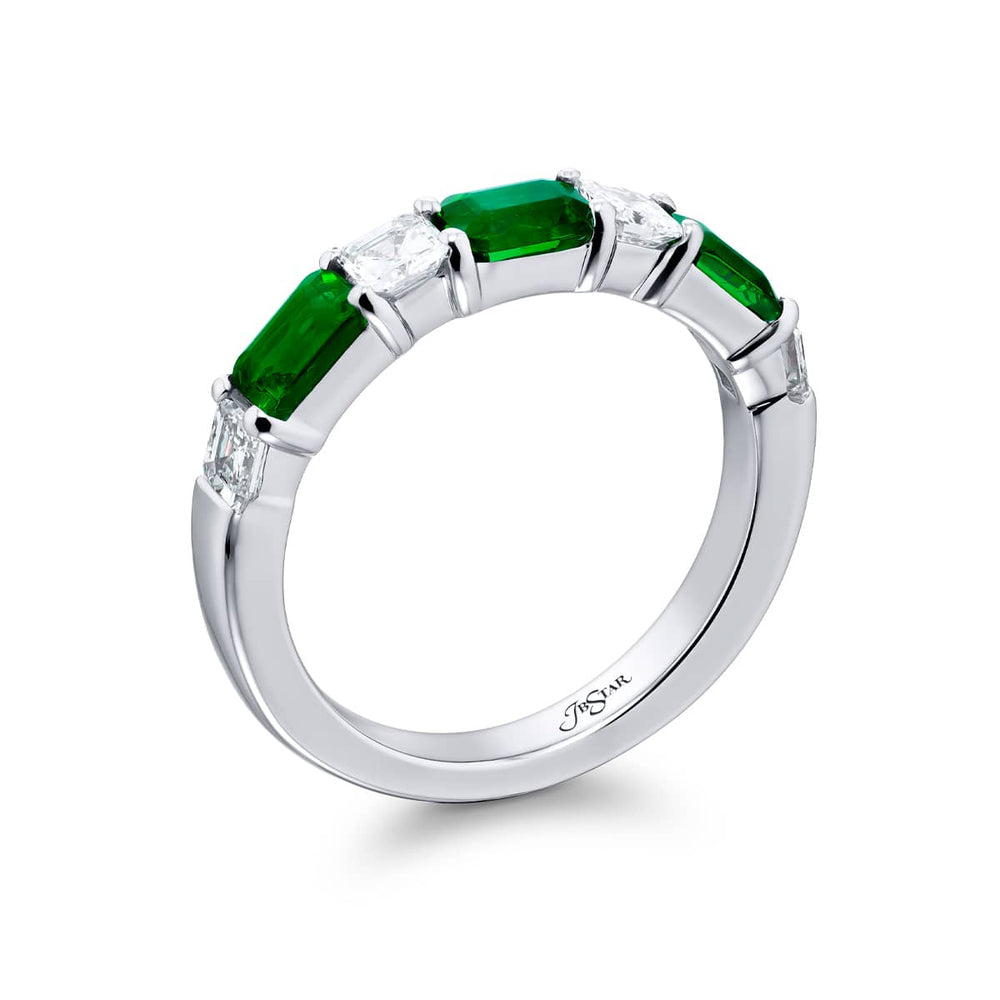 Elegance Elevated: Our classic East-West Emerald and Diamond Band. These beautiful emerald-cut emeralds blended with square emerald-cut diamonds are handcrafted in pure platinum.