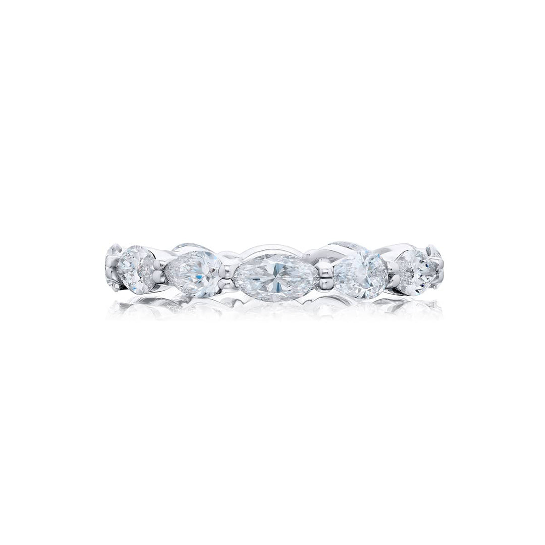 Alluring Eternity: Our stunning single row East-West Diamond Eternity Band. These twelve marquise and pear-shaped diamonds are handcrafted in pure platinum.