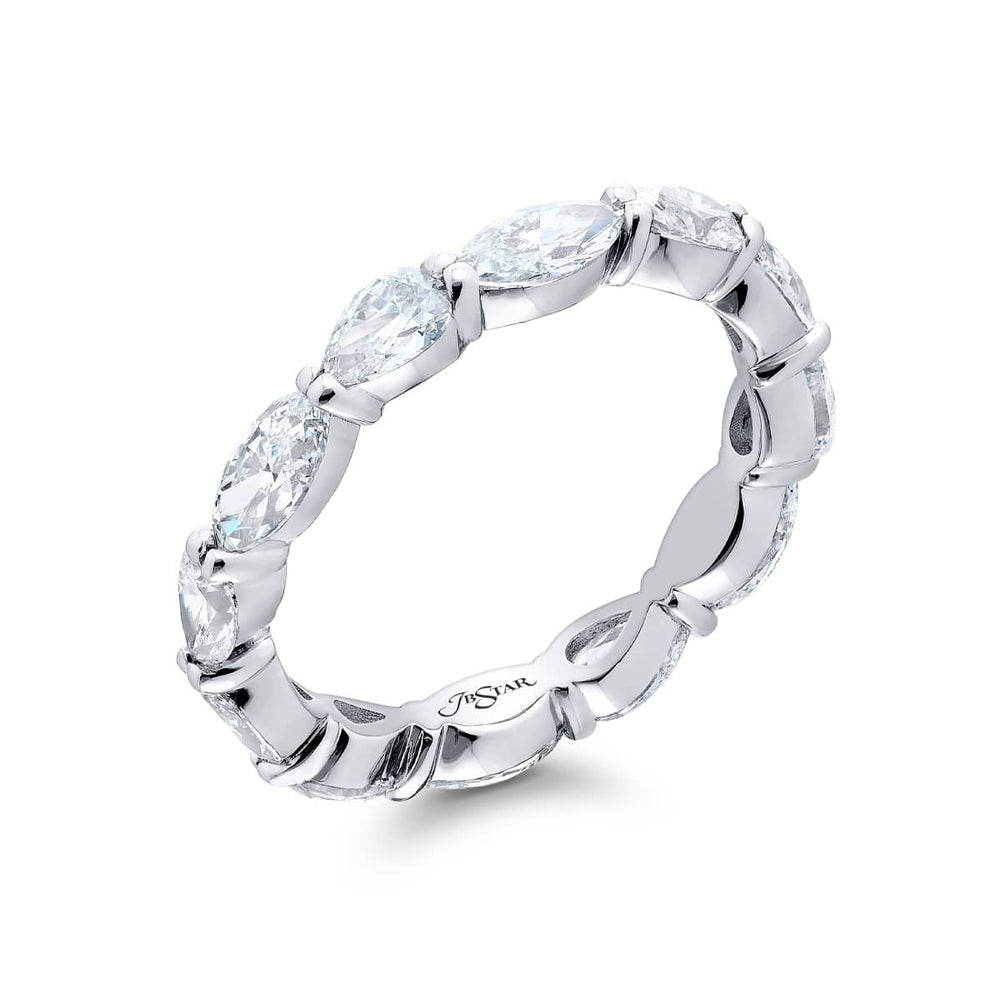 Alluring Eternity: Our stunning single row East-West Diamond Eternity Band. These twelve marquise and pear-shaped diamonds are handcrafted in pure platinum.