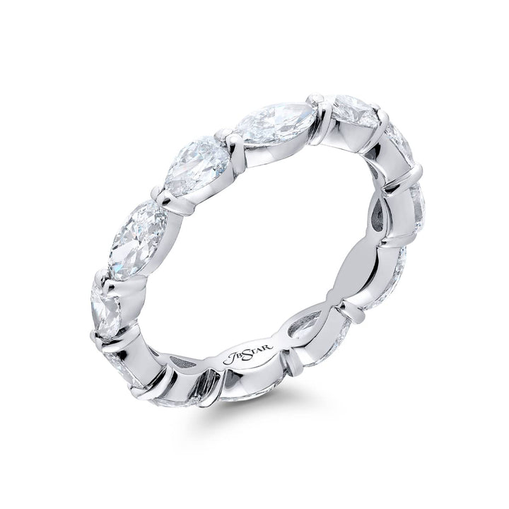 Alluring Eternity: Our stunning single row East-West Diamond Eternity Band. These twelve marquise and pear-shaped diamonds are handcrafted in pure platinum.