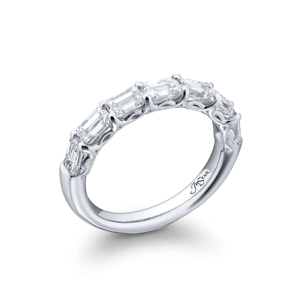 Elegance Elevated: Our classic single row East-West Diamond Band. These seven beautiful emerald-cut diamonds are handcrafted in pure platinum.