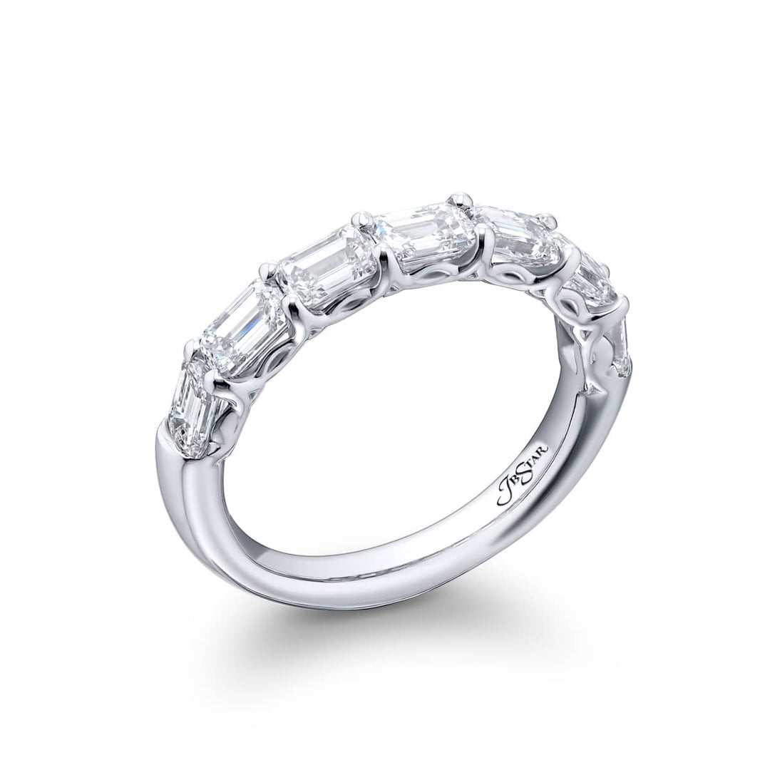 Elegance Elevated: Our classic single row East-West Diamond Band. These seven beautiful emerald-cut diamonds are handcrafted in pure platinum.