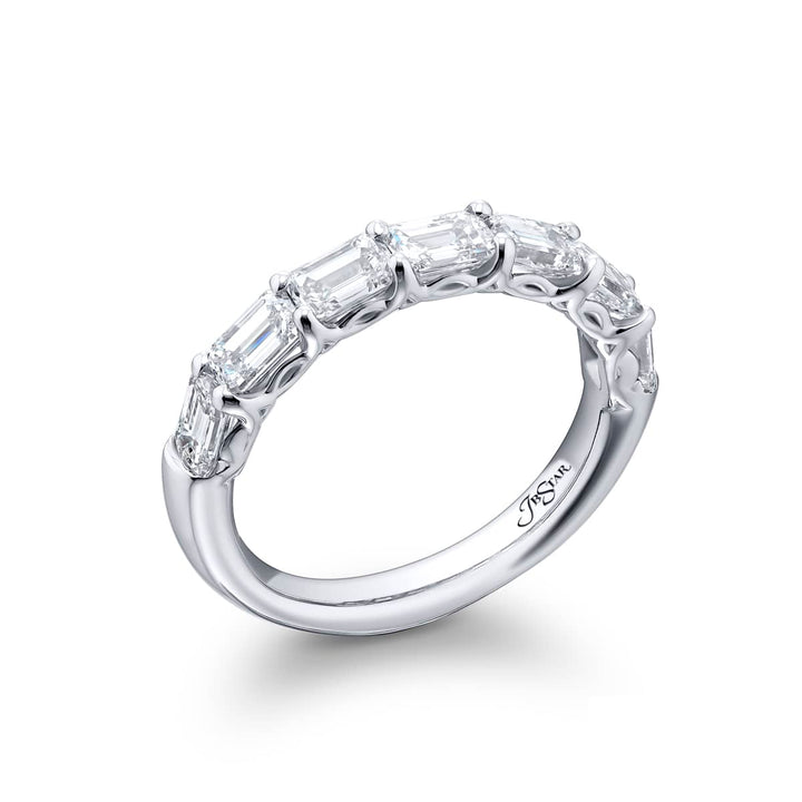 Elegance Elevated: Our classic single row East-West Diamond Band. These seven beautiful emerald-cut diamonds are handcrafted in pure platinum.