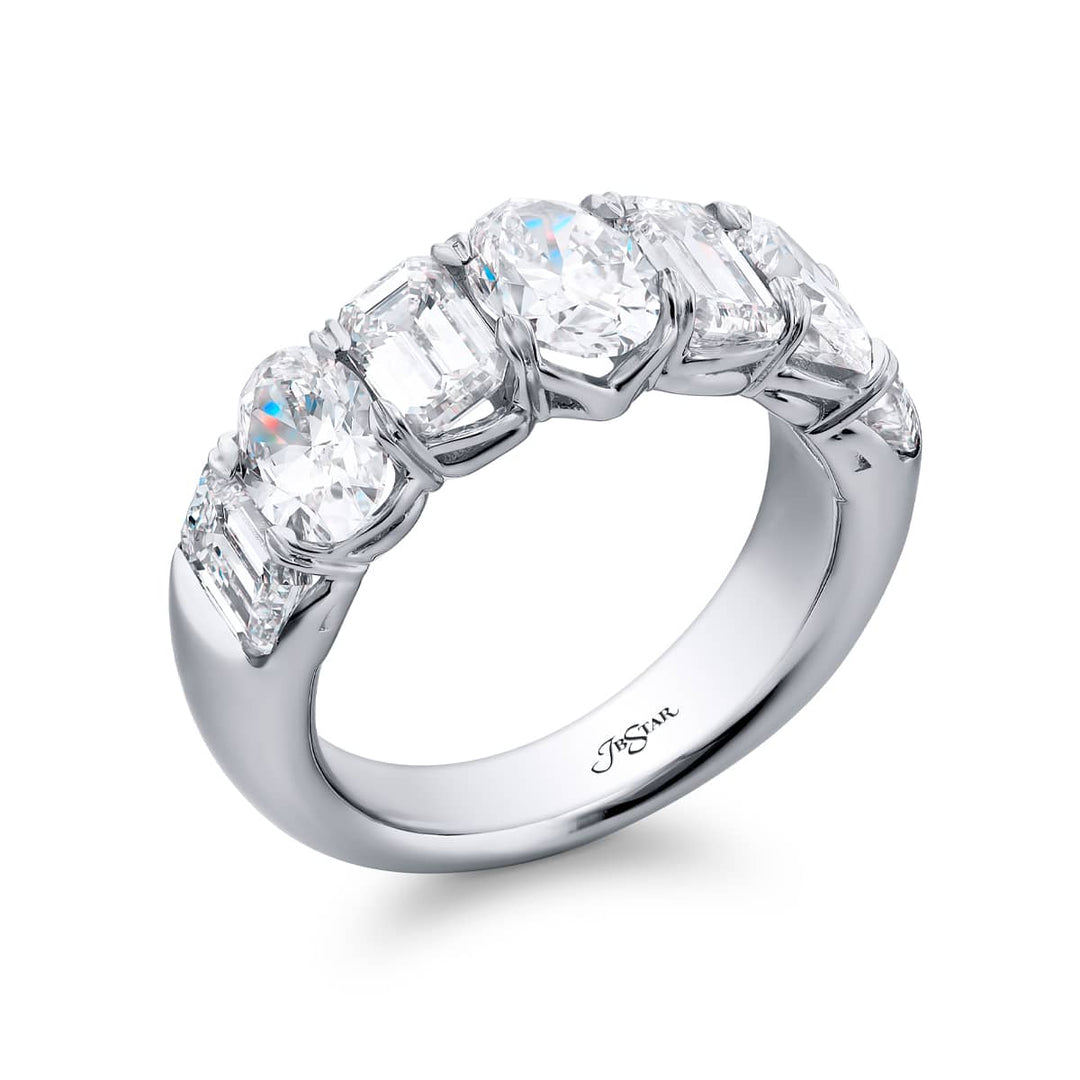 Elegance Elevated: Our signature 4.10 ctw. Diamond Band. These beautiful emerald-cut diamonds blended with oval diamonds are handcrafted in pure platinum.