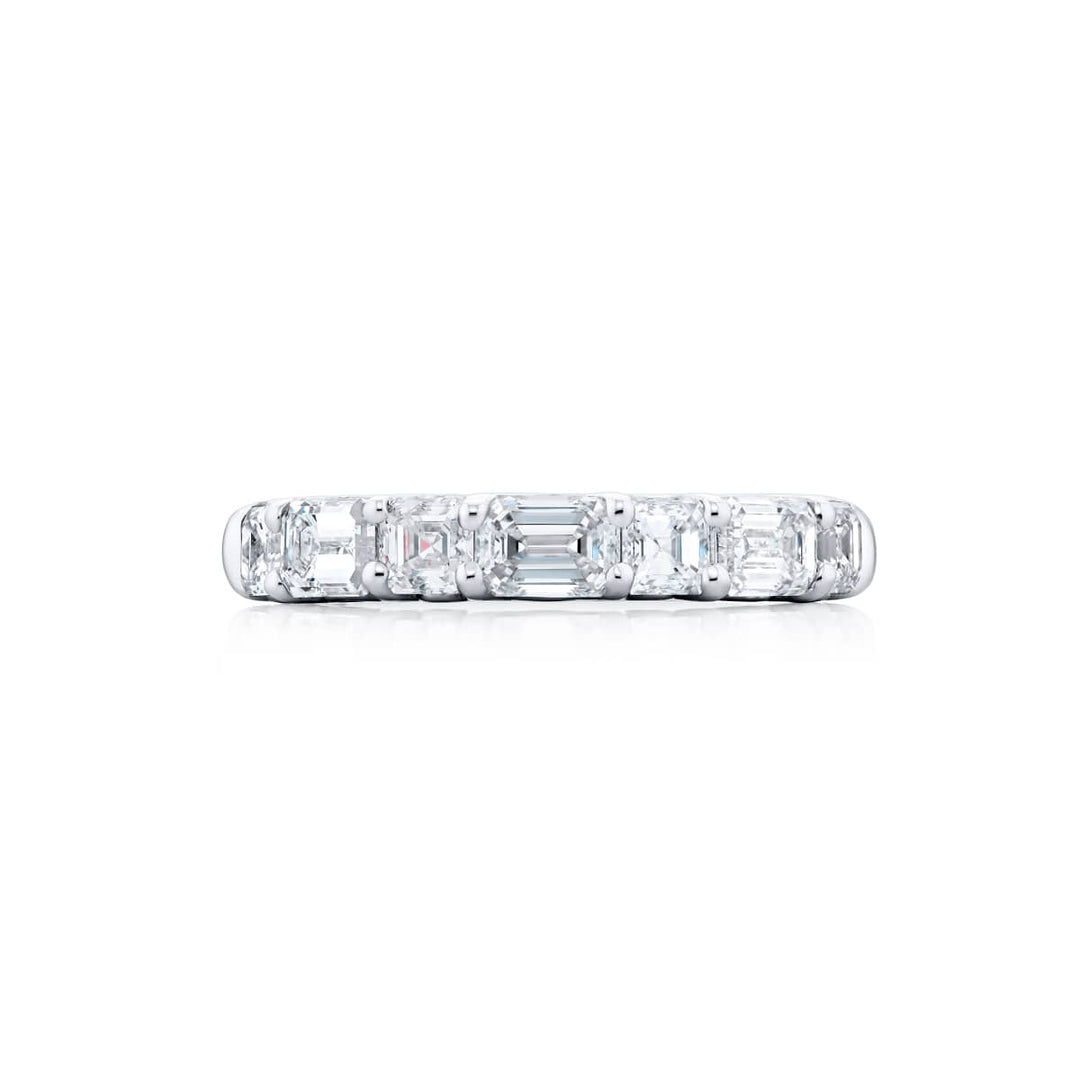 Elegance Elevated: Our classic 1.60 ctw. East-West single row Diamond Band. These beautiful emerald-cut diamonds accompany square emerald-cut diamonds and are handcrafted in pure platinum.